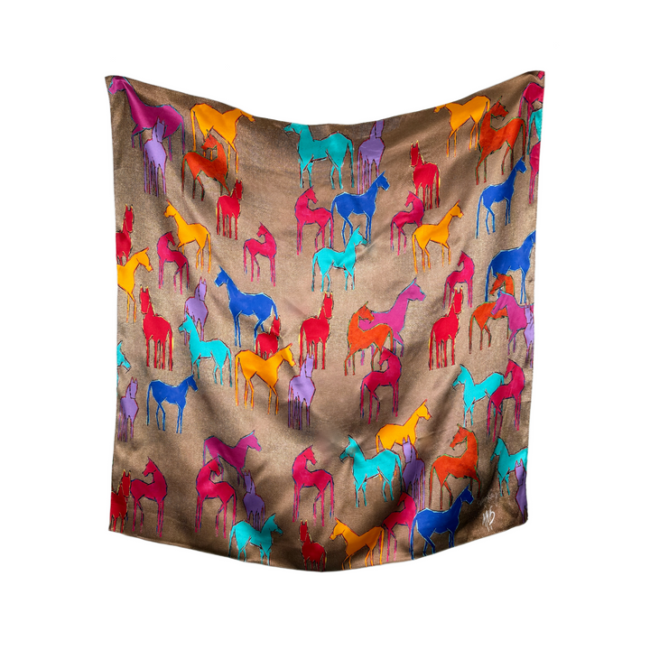Colorful horse patterned fabric on a brown background
